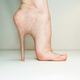 Illustration for article titled Stiletto implants make your feet look just like Barbies